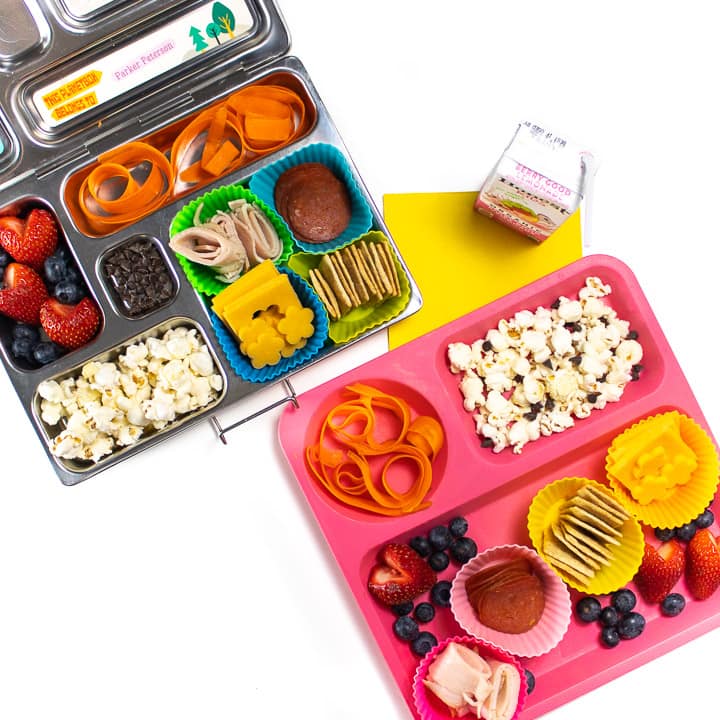 在Bento学校午餐盒中为孩子们提供的自制午餐会以及家庭午餐的盘子。bob平台