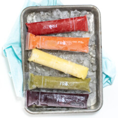 小银烤板冰柜爆破彩虹色加冰和蓝餐巾